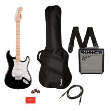 A black and white electric guitar with a maple neck, a black guitar case, a small Squier amplifier, picks, a cable, and a strap.