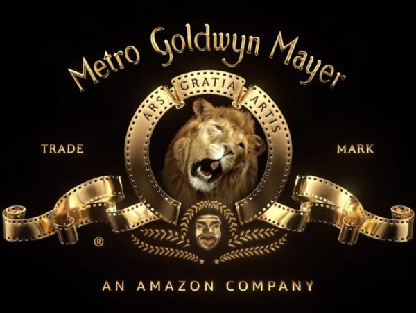 Logo of Metro Goldwyn Mayer with a roaring lion in the center, surrounded by a golden film strip and the text "An Amazon Company" below.